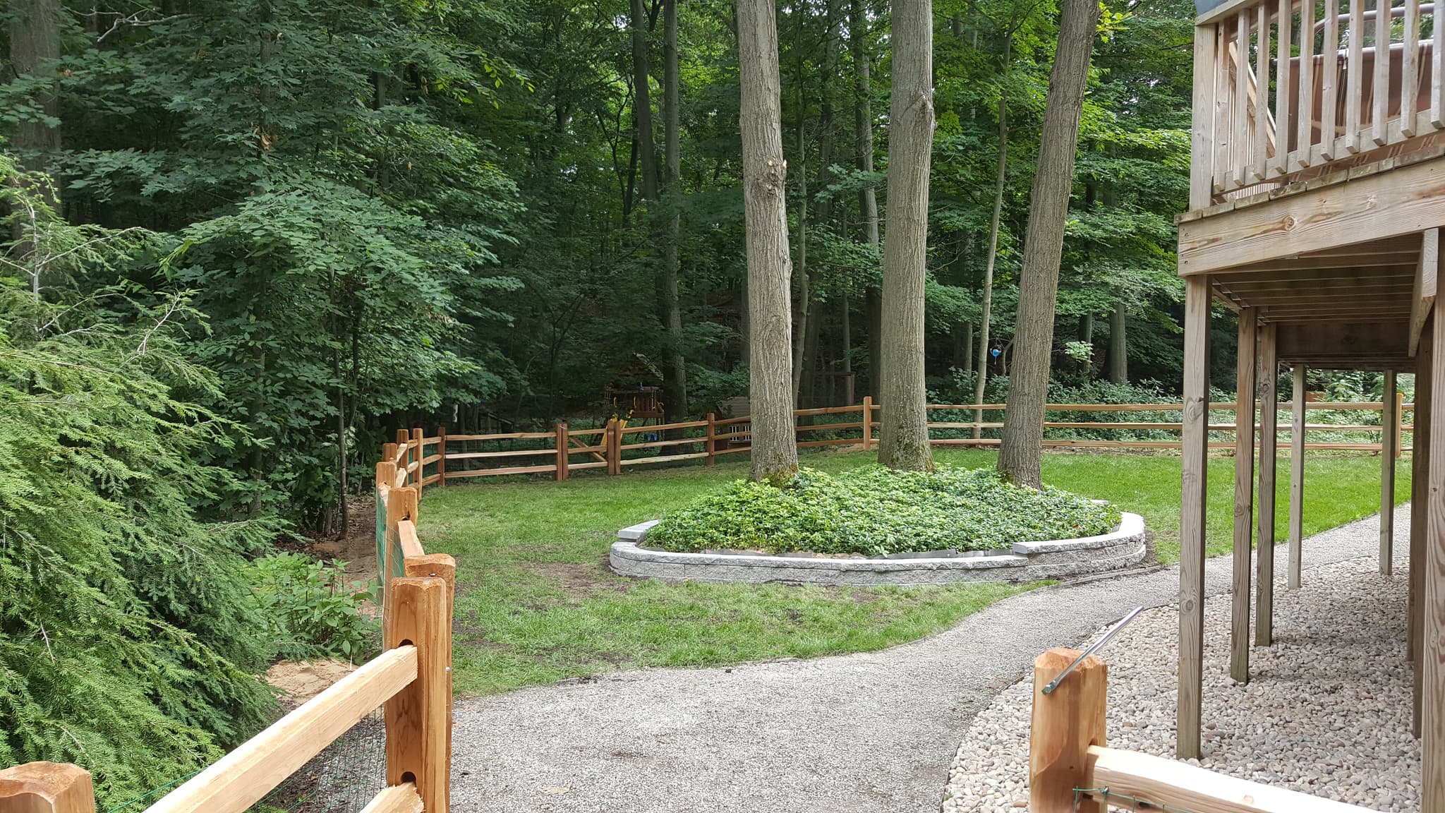 Backyard Fencing & Beds - Landscaping project by Aesthetic Gardener Holland Michigan