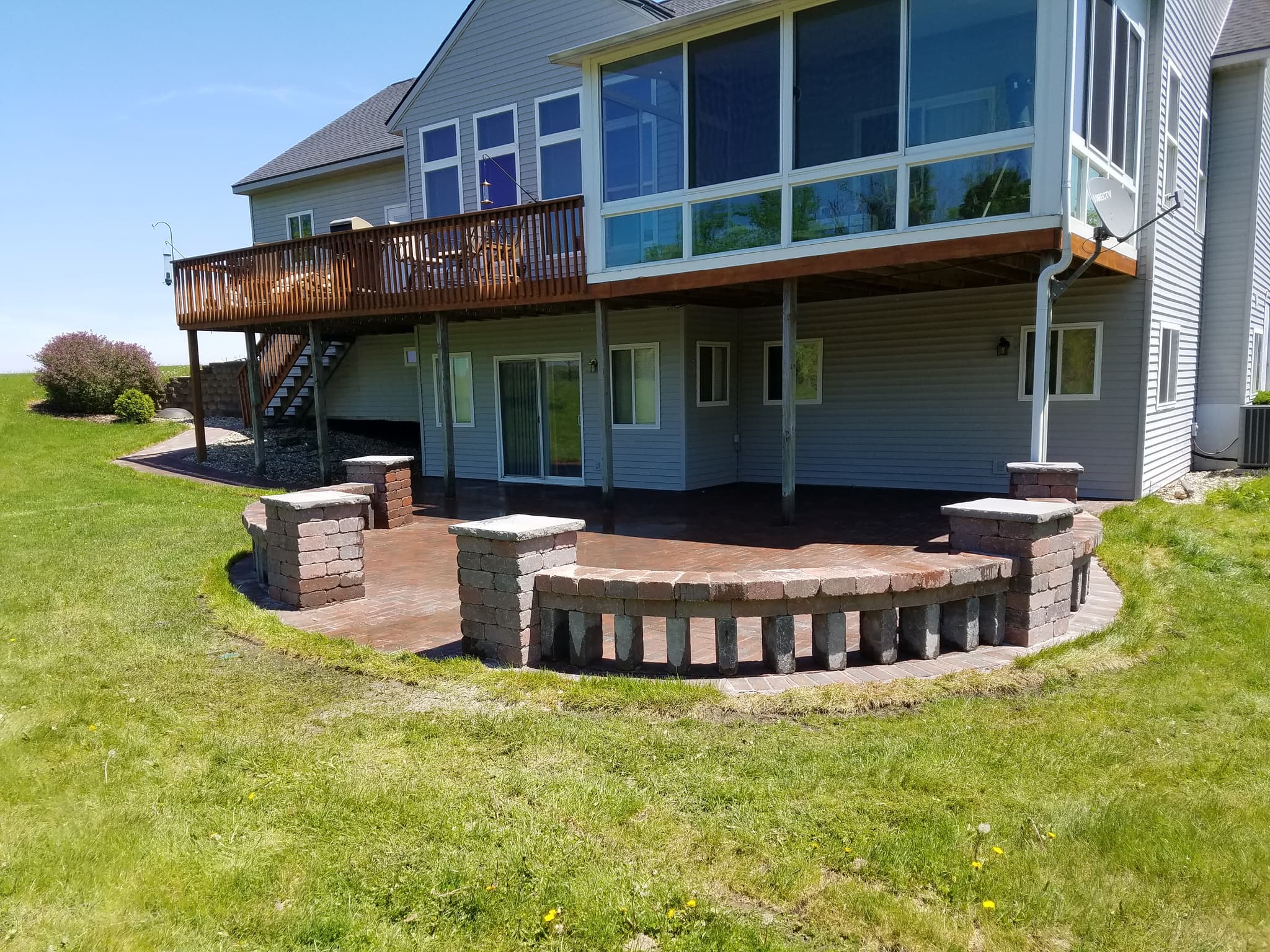 Brick patio and hardscaping by Aesthetic Gardener in Holland Michigan